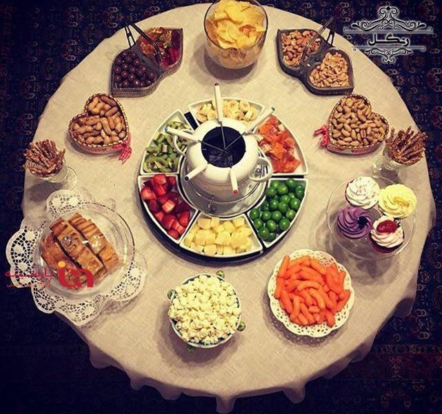 مدل چیدمان و دیزاین تزیین میز پذیرایی برای مهمانی و دورهمی